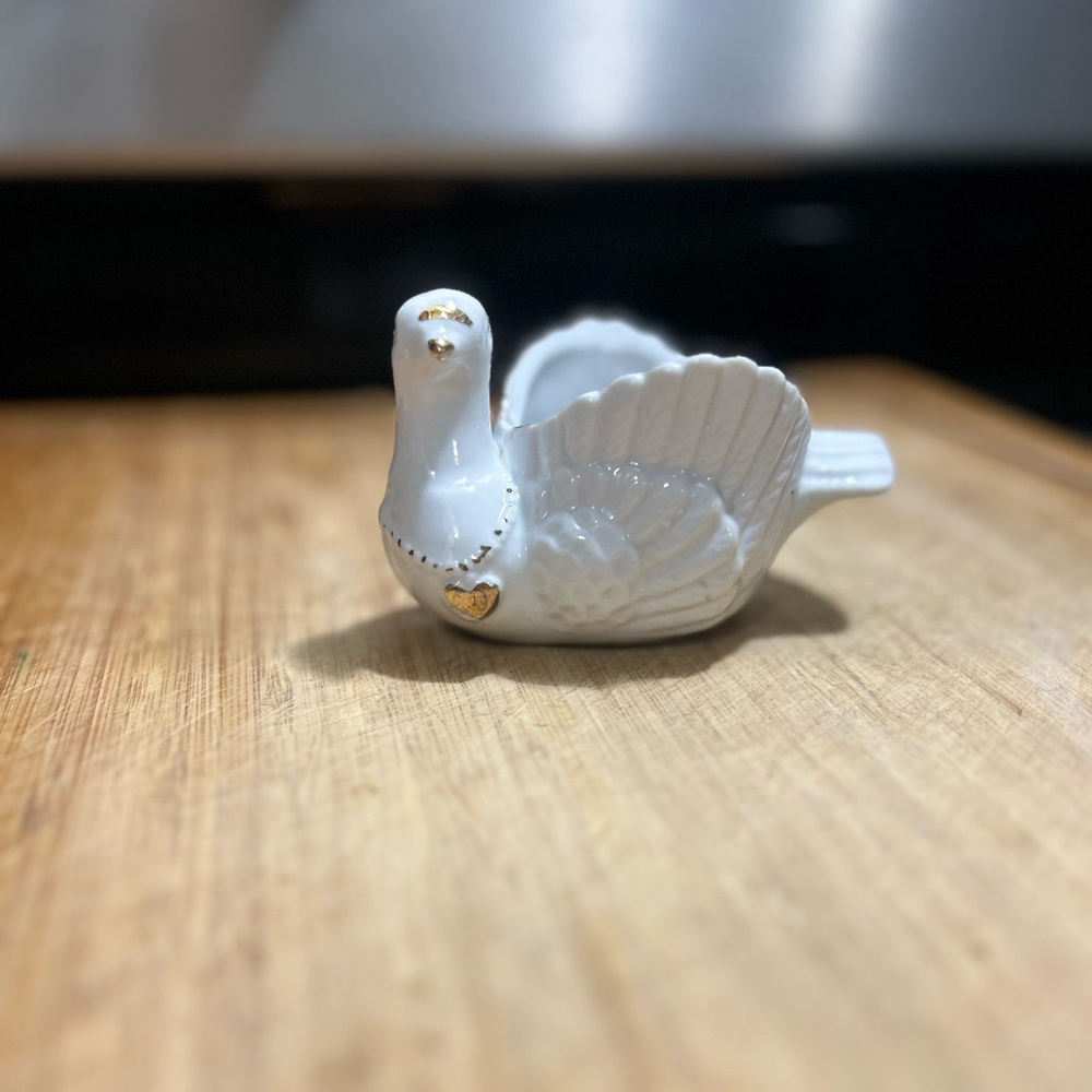 Porcelain dove figurine